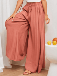 <tc>Elegantné nohavice Tanga oranžové</tc>